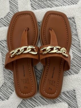 New never worn gold buckle sandals